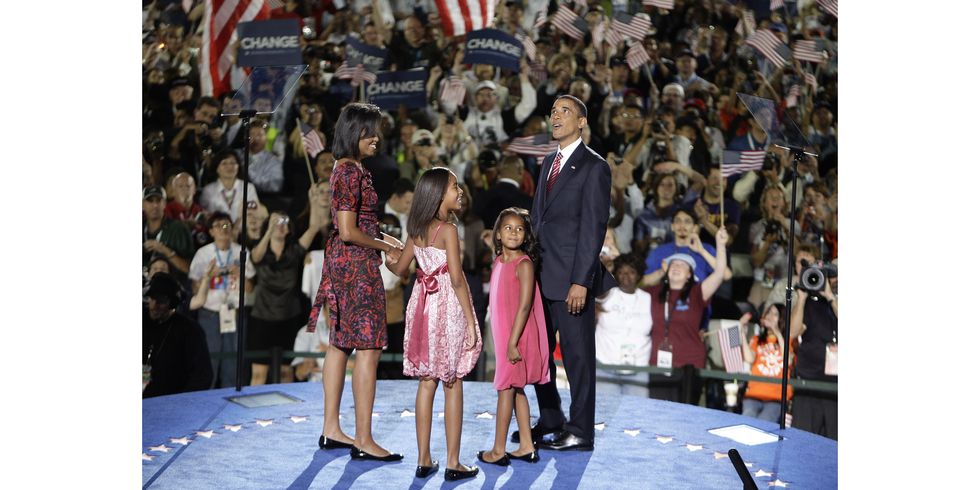 DENVER - AUGUST 28:  (L-R) Michelle Obama, Malia Obama, Sasha Obama and U.S. Sen. Barack Obama (D-IL) stand on stage delegates after he accepted the Democratic presidential nomination at Invesco Field at Mile High at the 2008 Democratic National Convention (DNC) August 28, 2008 in Denver, Colorado. Obama's acceptance speech coincides today with the 45th anniversary of Rev. Martin Luther King Jr. delivery of the 