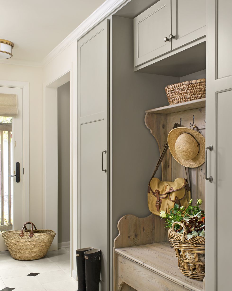 <p>The practical tone adds a bit of sophistication to hardworking spaces, such as the mudroom.&nbsp;</p>