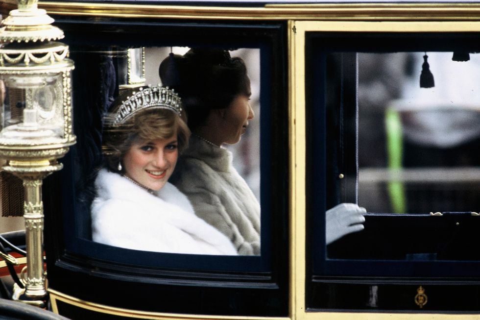 Diana with Princess Anne en route to the State Opening of Parliament in November 1981