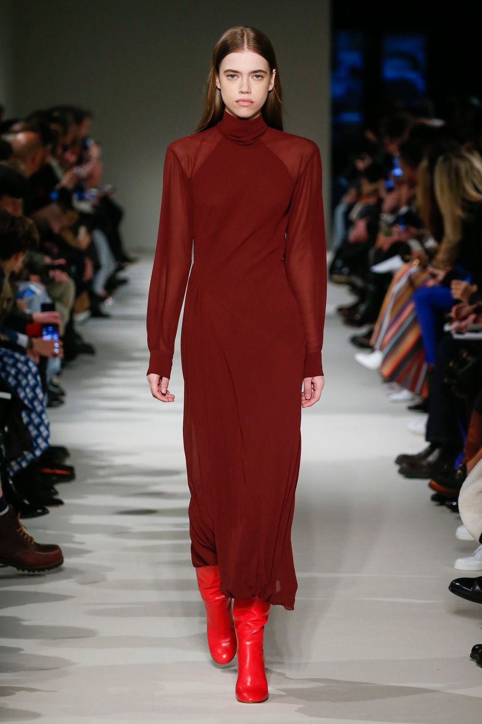 Clothing, Footwear, Fashion show, Shoulder, Runway, Red, Joint, Outerwear, Fashion model, Style, 