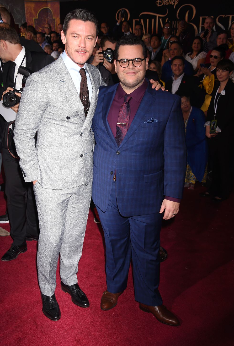 HOLLYWOOD, CA - MARCH 02: Actors Luke Evans (L) and Josh Gad arrive at the Premiere Of Disney's 'Beauty And The Beast' at the El Capitan Theatre on March 2, 2017 in Los Angeles, California. (Photo by Jeffrey Mayer/WireImage)