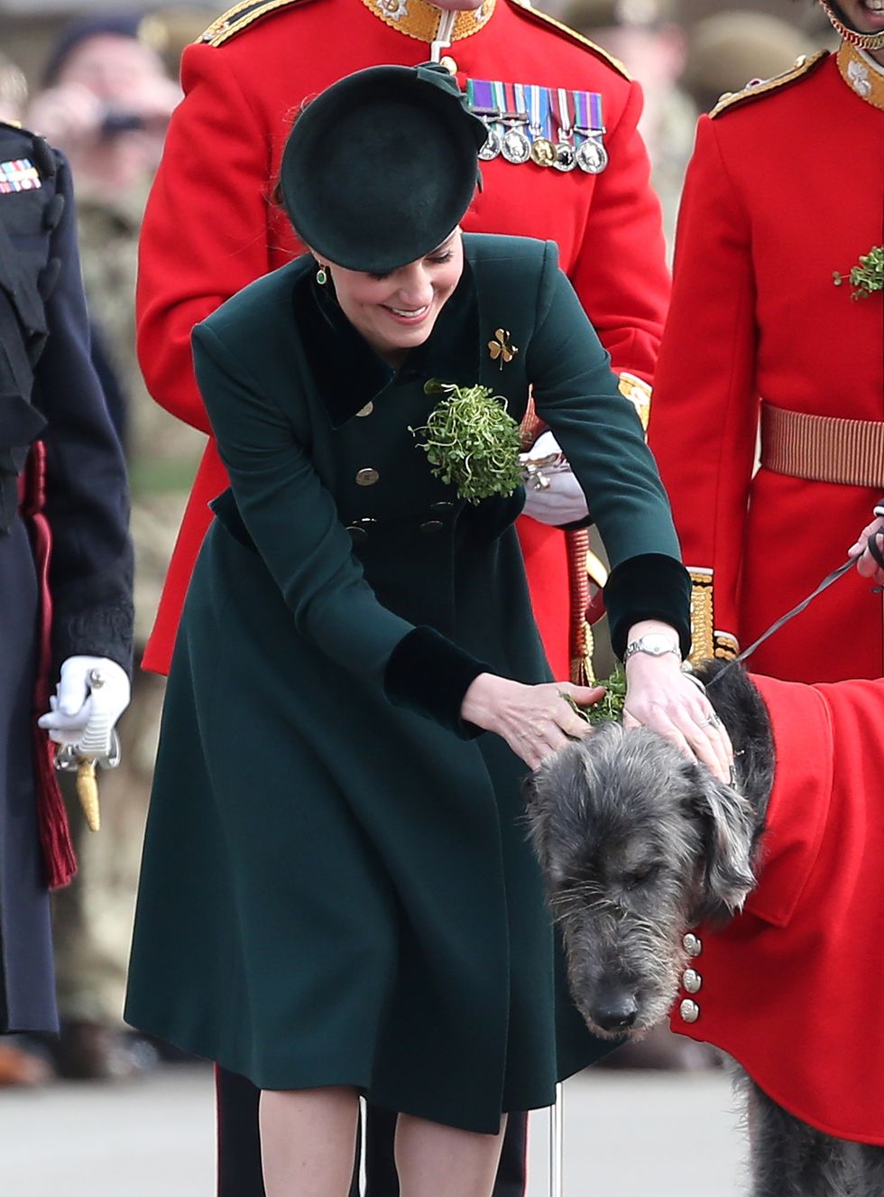 <p>Greeting the&nbsp;First&nbsp;Battalion Irish Guardsmen<span class="redactor-invisible-space" data-redactor-tag="span" data-redactor-class="redactor-invisible-space" data-verified="redactor">'s mascot, an Irish Wolfhound named</span><span class="redactor-invisible-space" data-verified="redactor" data-redactor-tag="span" data-redactor-class="redactor-invisible-space"> Domhnall<span class="redactor-invisible-space" data-verified="redactor" data-redactor-tag="span" data-redactor-class="redactor-invisible-space">,</span>&nbsp;during the annual Irish Guards St Patrick's Day Parade in London<span class="redactor-invisible-space" data-verified="redactor" data-redactor-tag="span" data-redactor-class="redactor-invisible-space">.</span></span></p>