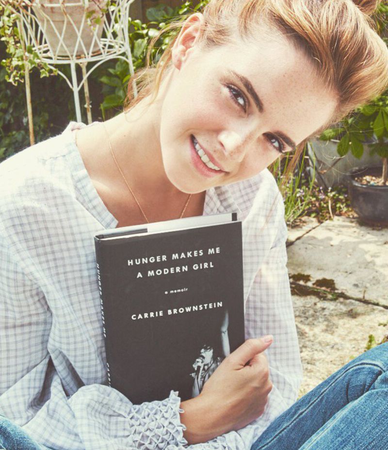 Denim, Jeans, Sitting, Happy, Facial expression, People in nature, Tooth, Publication, Reading, Lap, 