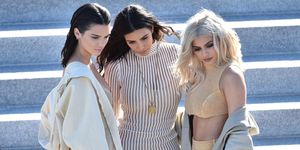 Kendall Jenner, Kim Kardashian and Kylie Jenner at the Yeezy show