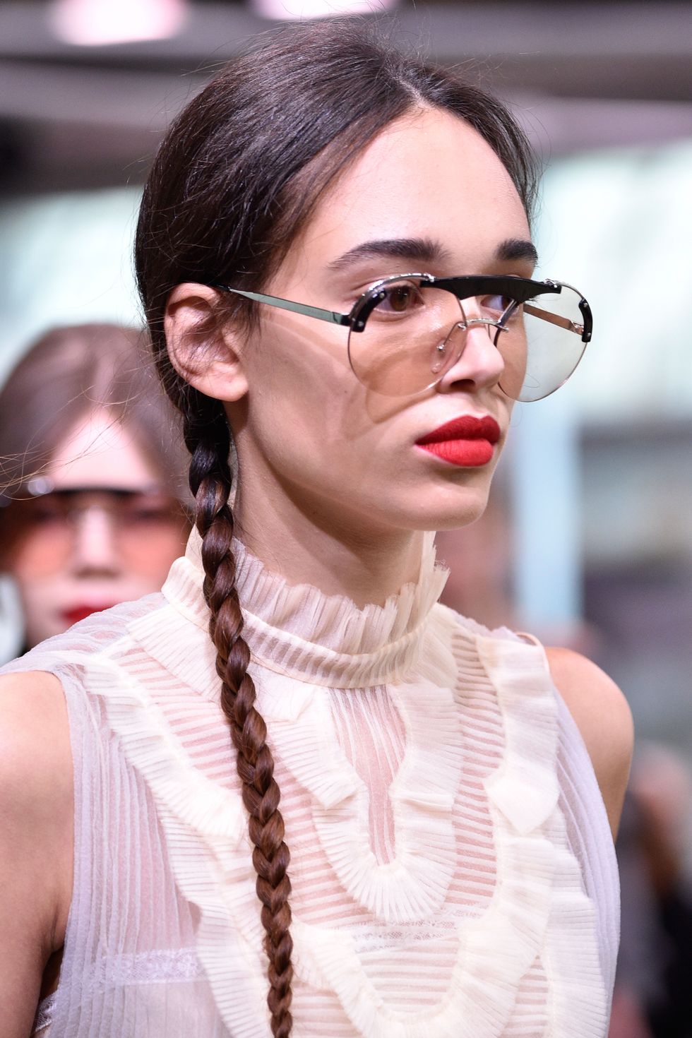 Prada Resort 2018 pigtail plaits and red lips