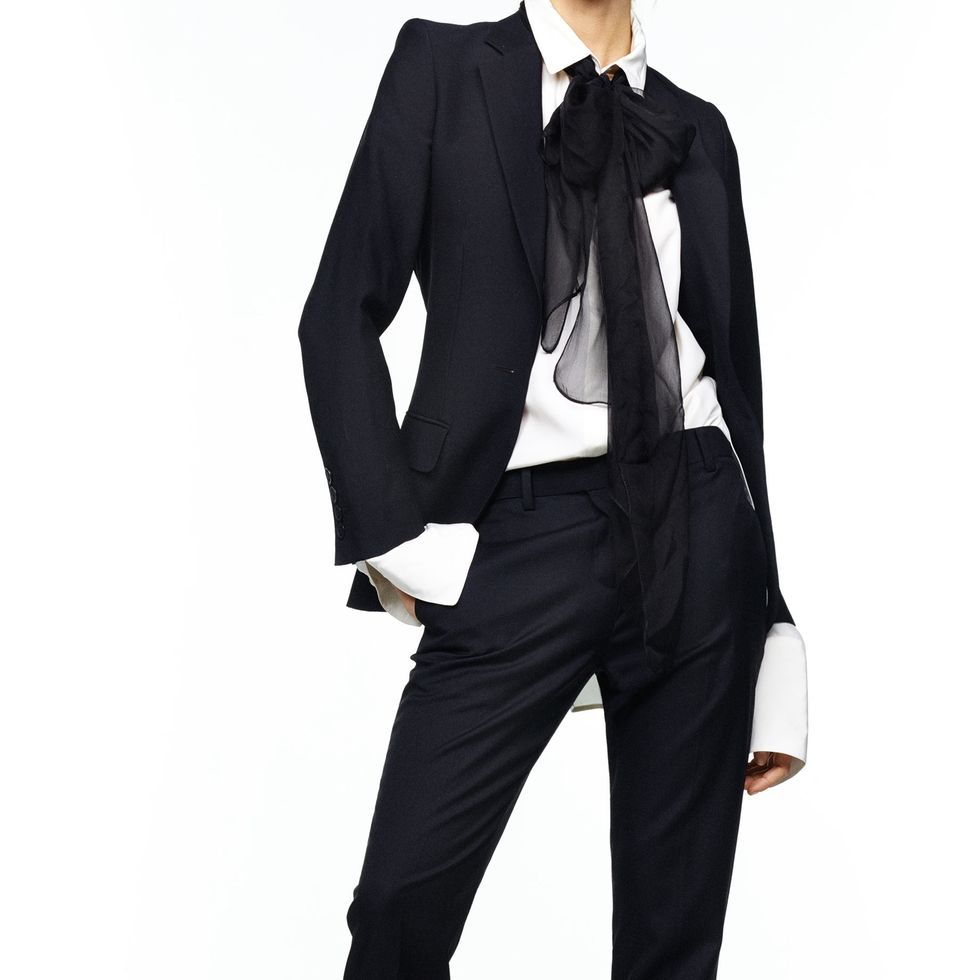Suit, Clothing, Formal wear, Tuxedo, Standing, Outerwear, Trousers, Neck, Blazer, Tie, 