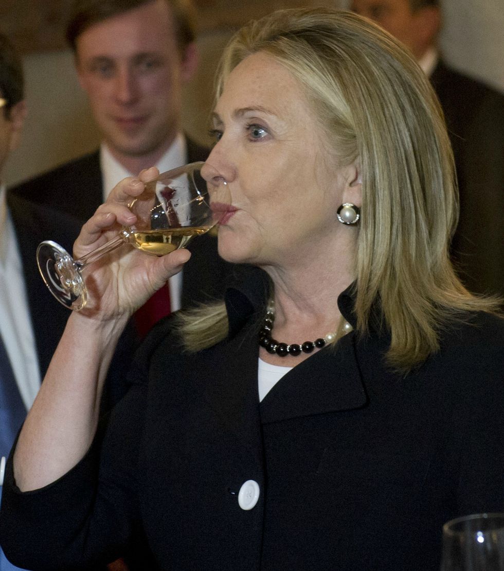 Hillary Clinton drinking wine