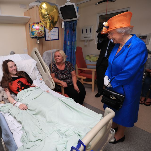 The Queen with young victim of the Manchester terror attack  Millie Robinson at the Royal Manchester Children's Hospita