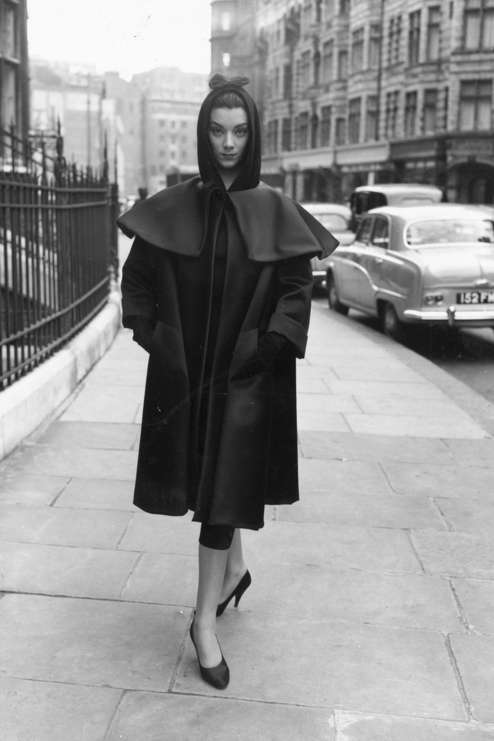 A model wearing a Balenciaga coat in 1955