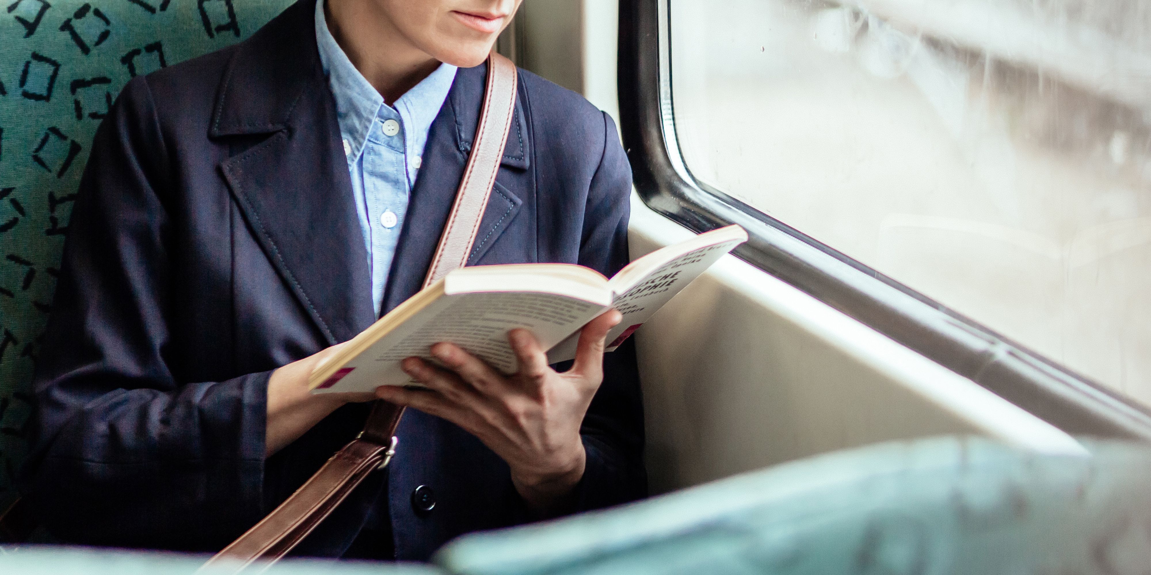 Quickly reads. Reading on the Train. Reading Light on a Train. Flash Fiction book on how to write.