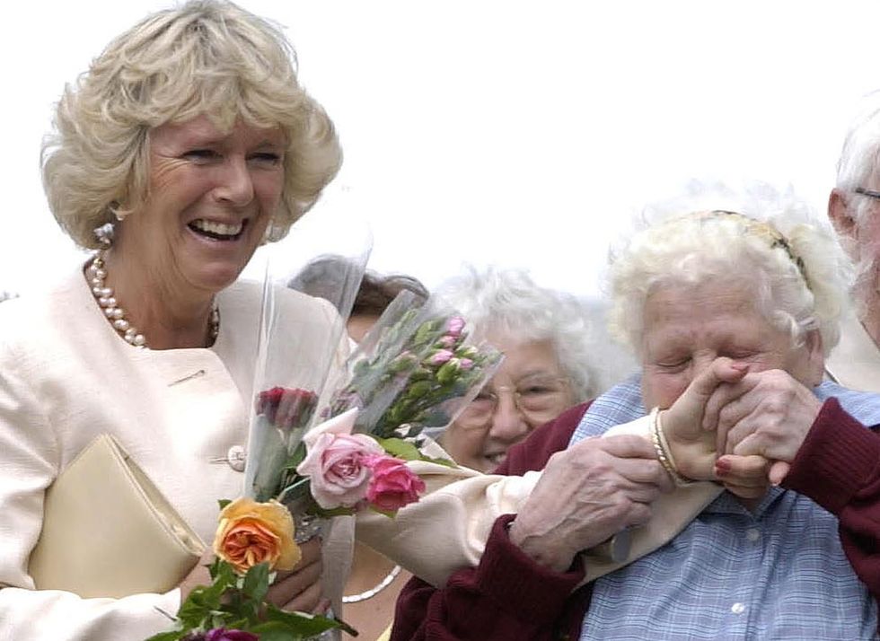 Camilla Parker-Bowles is pictured being given a kiss at Sandringham Estate on July 23, 2003 in Norfolk, England. Clarence House has confirmed today that Charles and partner Camilla Parker-Bowles will marry, at a date expected to be circa April 6, 2005