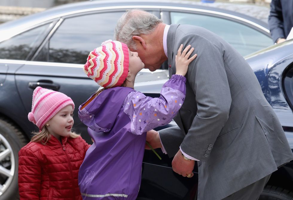 Prince Charles, Prince of Wales arrives at the FARA Foundation in Popesti Leordeni where he will meet young people and children housed by the charity, as well as a group of key supporters and young adults that graduated from FARA programmes, on the second day of his nine day European tour, on March 30, 2017 in Bucharest, Romania. The Prince of Wales, who has been patron of FARA since 2000, was greeted by Antonia Padurarua, young girl who ran up to him from the street to kiss him and her sister Amalia Padurarua.