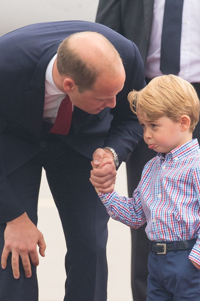 The Duke of Cambridge at Warsaw's Chopin Airport with Prince George at the start of their five-day tour of Poland and Germany