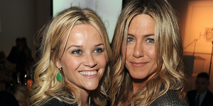 Reese Witherspoon (L) and Jennifer Aniston attend ELLE's 18th Annual Women in Hollywood Tribute held at the Four Seasons Hotel on October 17, 2011