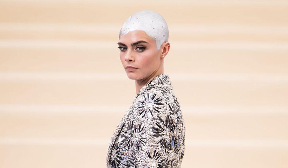 Cara Delevingne at the Met Gala 2017 with a buzzcut