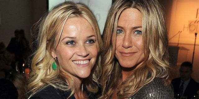 Reese Witherspoon (L) and Jennifer Aniston attend ELLE's 18th Annual Women in Hollywood Tribute held at the Four Seasons Hotel on October 17, 2011