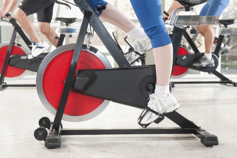Exercise equipment, Exercise machine, Human leg, Leg, Exercise, Stationary bicycle, Physical fitness, Gym, Muscle, Bench, 