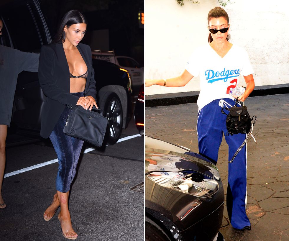 Kim and Kourtney Kardashian with Prada handbags