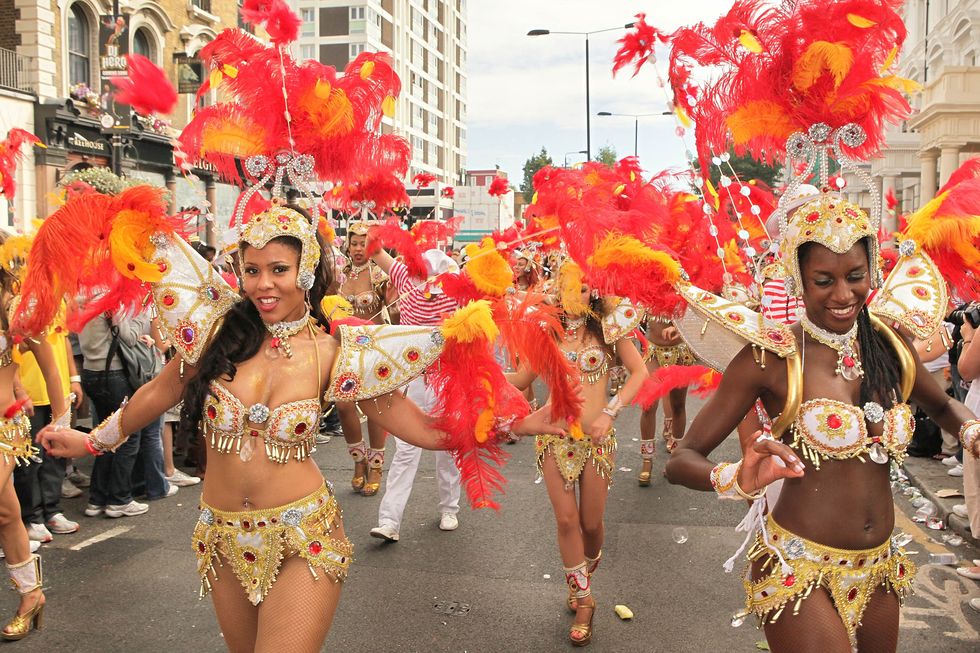 Samba, Carnival, Dance, Event, Red, Festival, Public event, Performing arts, Smile, Dancer, 