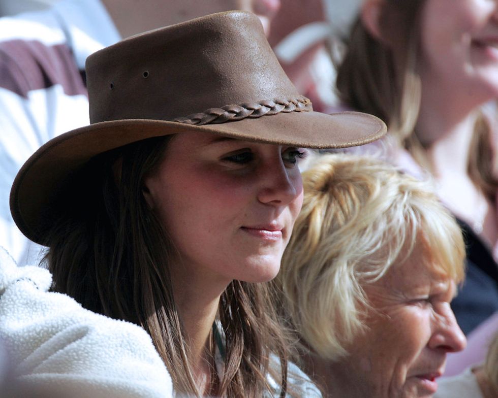 TETBURY, ENGLAND - AUGUST 6: Kate Middleton, girlfriend of Prince William, watches the events in the main arena, on the second day of the Gatcombe Park Festival of British Eventing at Gatcombe Park, on August 6, 2005 near Tetbury, England.(Photo by Matt Cardy/Getty Images) 