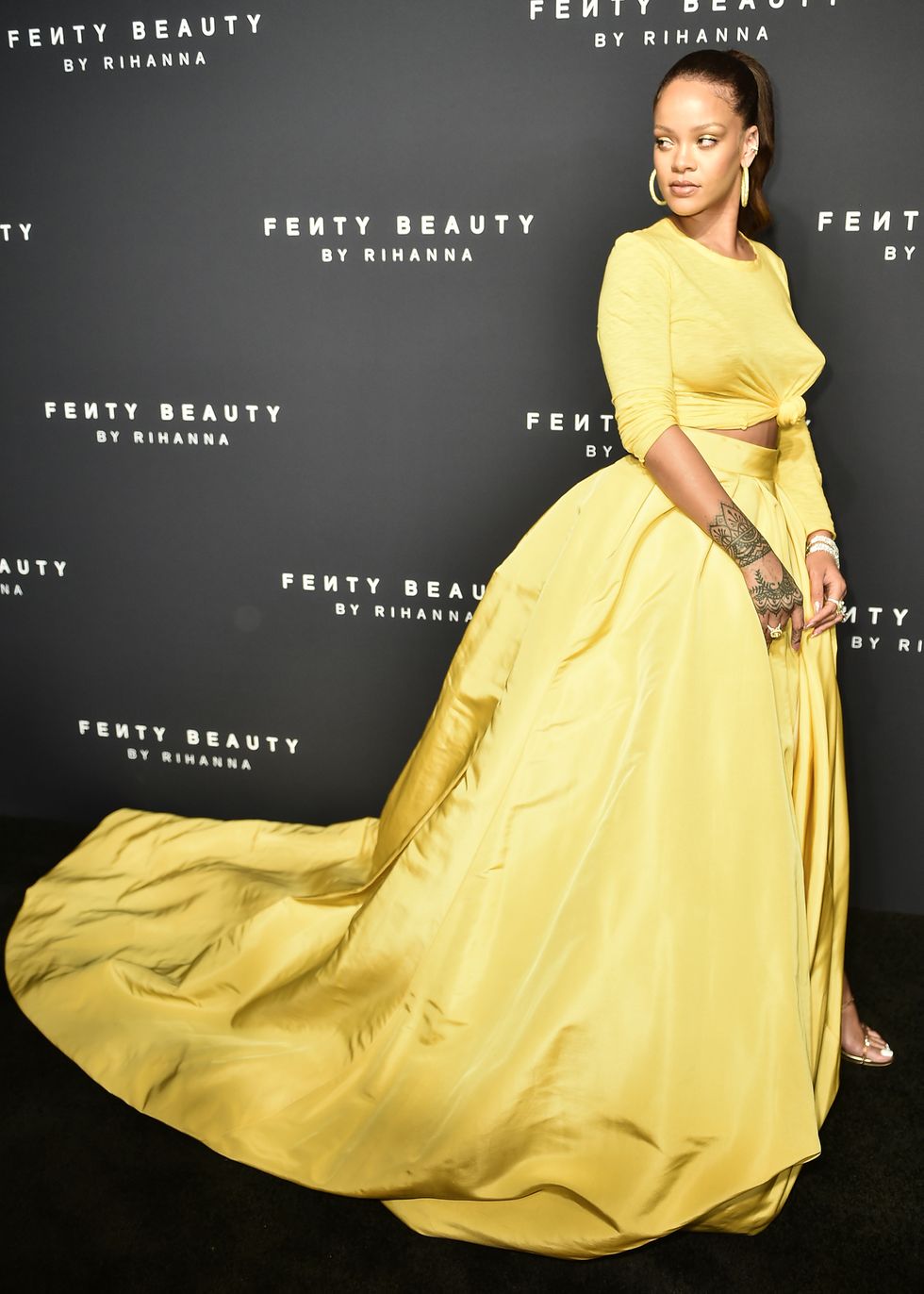 Rihanna in yellow dress at Fenty Beauty launch