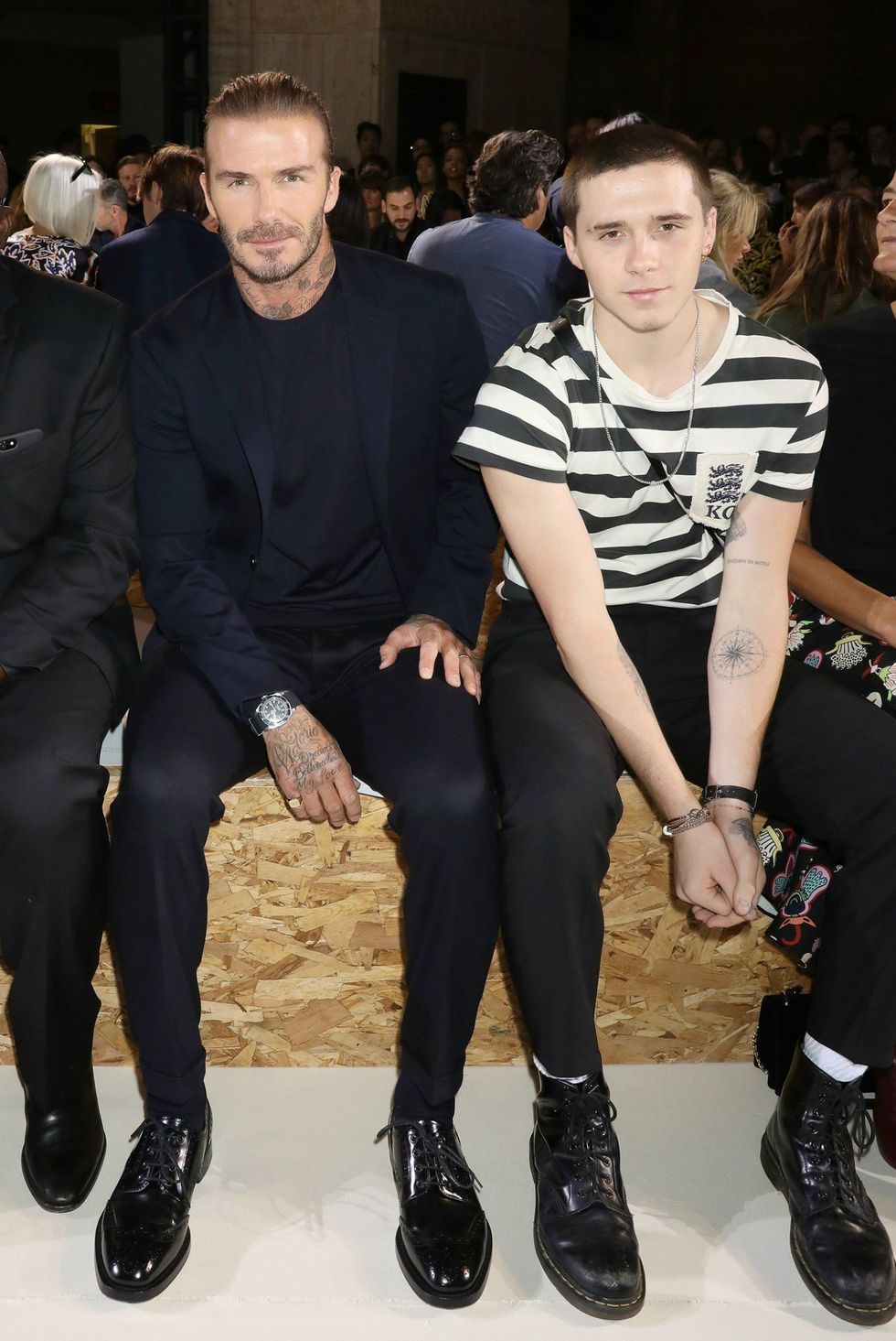 David and Brooklyn Beckham at New York Fashion Week