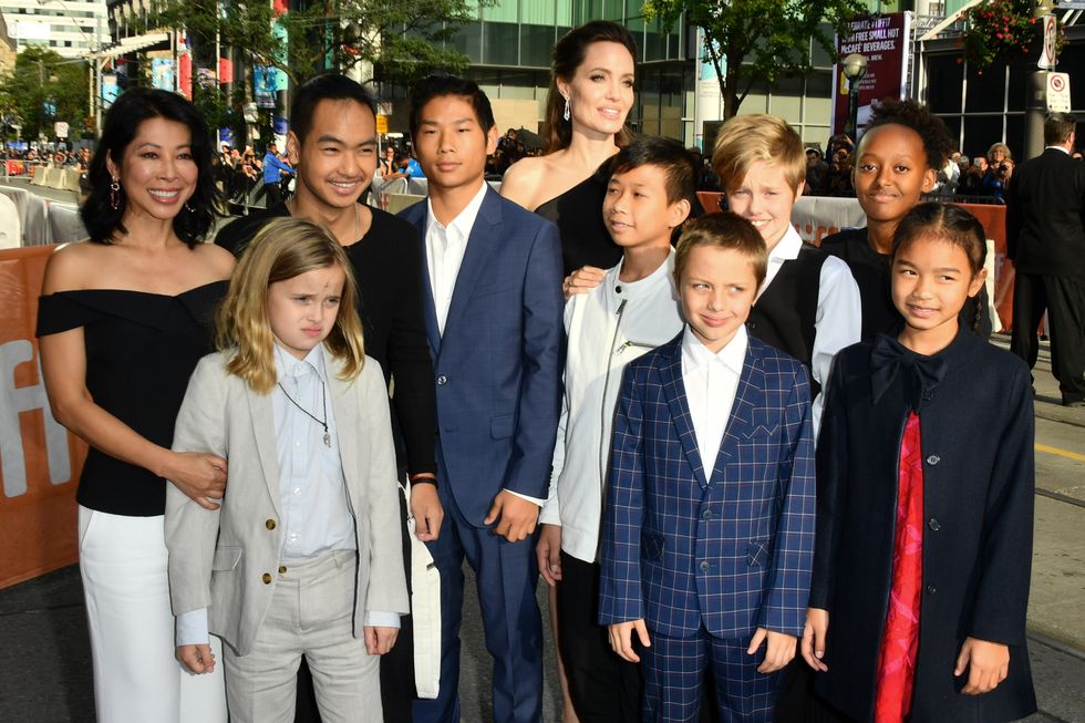 Loung Un and two of the film's stars with Angelina Jolie and her children on the red carpet
