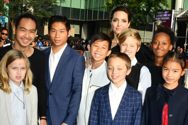 Vivienne Jolie-Pitt, Maddox Jolie-Pitt, Pax Jolie-Pitt, Kimhak Mun, Knox Jolie-Pitt, Shiloh Jolie-Pitt, Angelina Jolie, Zahara Jolie-Pitt and Sareum Srey Moch attend 2017 Toronto International Film Festival - 'First They Killed My Father' at the TFF