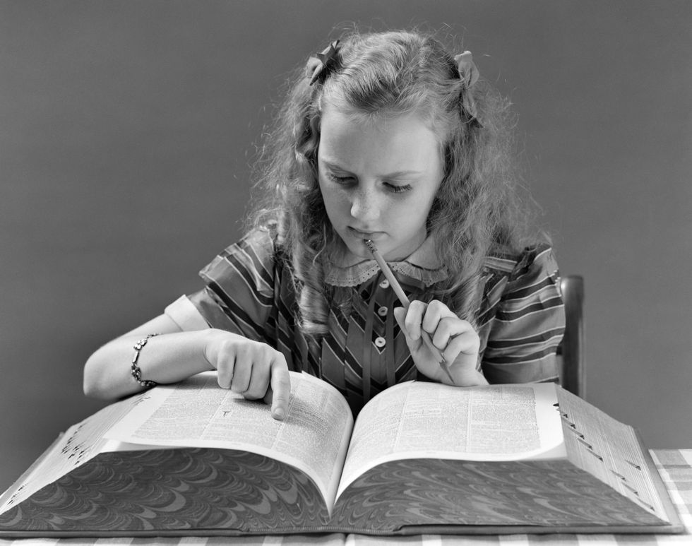 1930s girl reading dictionary