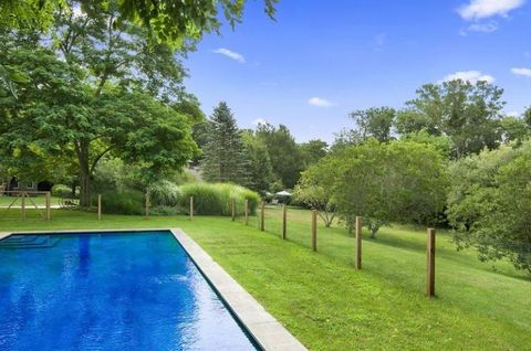 Grass, Swimming pool, Tree, Landscape, Garden, Real estate, Shrub, Lawn, Composite material, Park, 