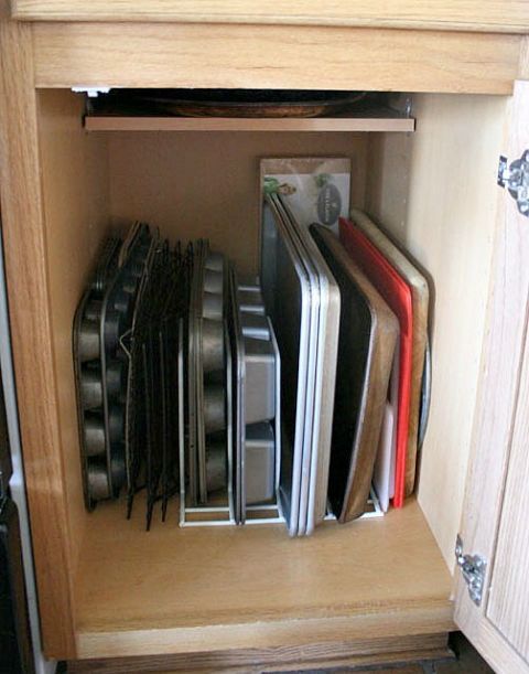 <p>Even though muffin tins and cookie sheets result in sweet, sweet treats, let's be honest: these bulky items are some of the most annoying tools to organize. But when you give each item a dedicated slot in your organizer they're way more bearable (trust us).</p><p><a href="http://www.remodelaholic.com/quick-clean-pr-3/" target="_blank"><em>See more at Remodelaholic »</em></a></p>