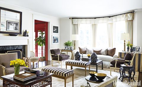 <p>A welcoming mix of vintage and antique furniture adds elegance to a light-flooded Beverly Hills living room <a href="http://www.housebeautiful.com/home-remodeling/interior-designers/q-and-a/a5633/mary-mcdonald-interview" target="_blank">designed by Mary McDonald</a>. Leopold lamps by Mary McDonald for Robert Abbey. Walls in Benjamin Moore's Man on the Moon.</p>