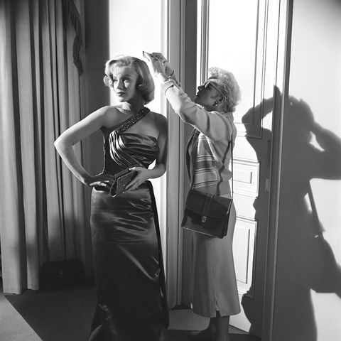 <p>On the set of <em>How To Marry A Millionaire</em> in 1953</p>