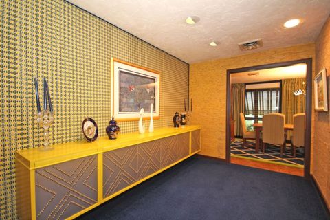 Yellow, Room, Floor, Interior design, Ceiling, Wall, Flooring, Picture frame, Interior design, Door, 