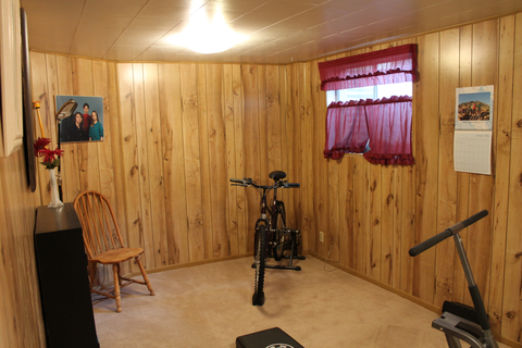 Wood, Lighting, Room, Bicycle accessory, Hardwood, Ceiling, Interior design, Bicycle, Bicycle saddle, Bicycle wheel, 