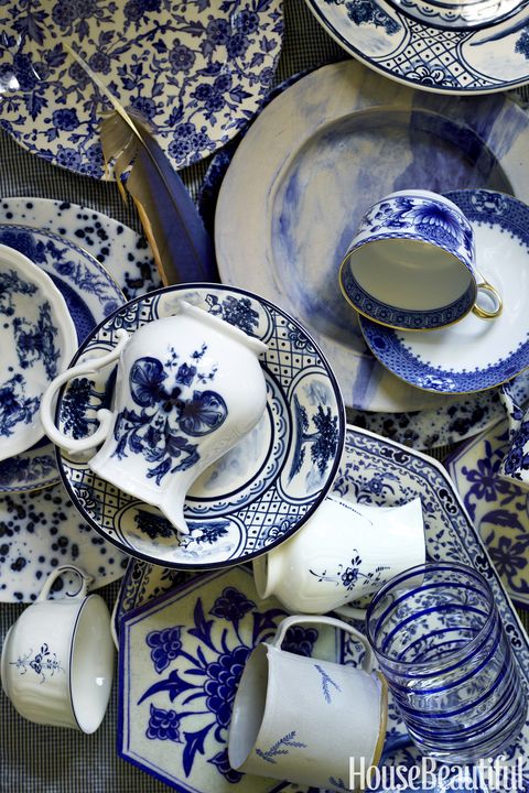 <p>Ralph Lauren Home's Arden salad plate (top left) and Regal Peacock dish (bottom right) coordinate with an Imperial Blue cup and saucer by Mottahedeh (top right).</p>