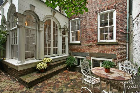 Window, Flowerpot, Table, House, Real estate, Outdoor furniture, Outdoor table, Brick, Door, Courtyard, 