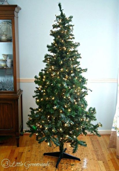 Wood, Interior design, Branch, Christmas tree, Christmas decoration, Room, Home, Interior design, Woody plant, Flooring, 