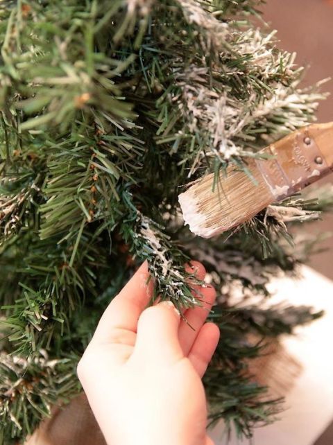 Finger, Woody plant, Nail, Christmas decoration, Christmas tree, Pine family, Thumb, Conifer, Natural material, Christmas, 