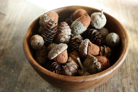 Ingredient, Food, Nut, Natural material, Acorn, Natural foods, Produce, Basket, Wicker, Still life photography, 
