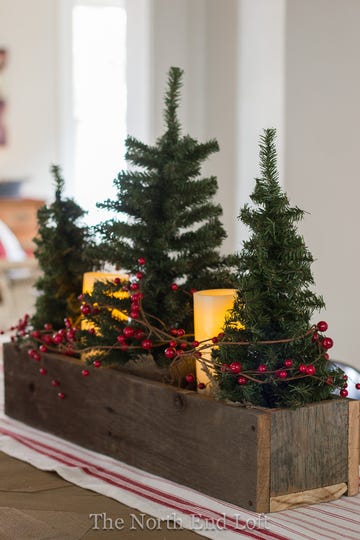 centro de mesa de navidad con mini abetos