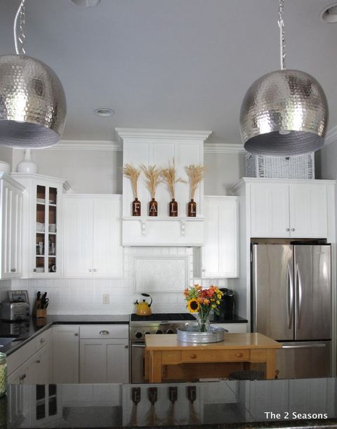 Room, Interior design, White, Light fixture, Wall, Ceiling, Interior design, Lighting accessory, Cabinetry, Cupboard, 