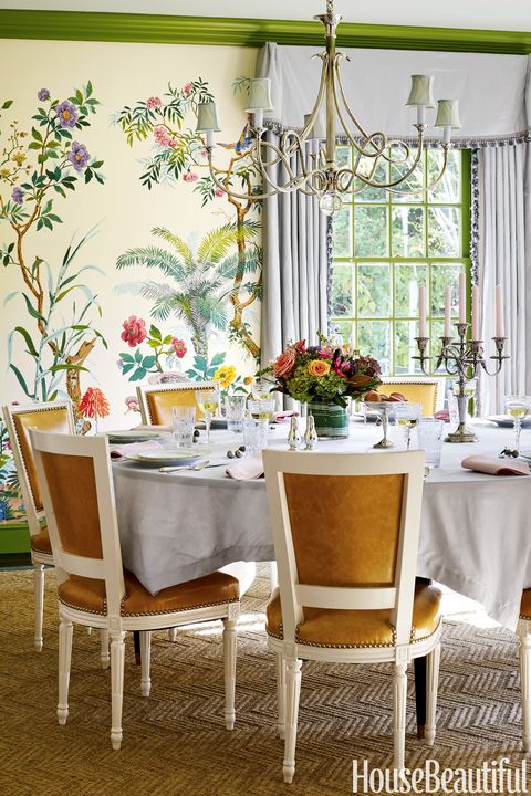 the dining room now bursts with high octane design, from the zuber wallpaper to the molding's pantone shade of piquant green
