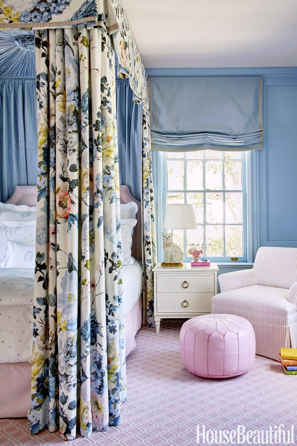 In the bedroom of her young daughter, Grace, McCarthy conjures a "full-on princess fantasy" with a bed canopy in a Designers Guild floral. 