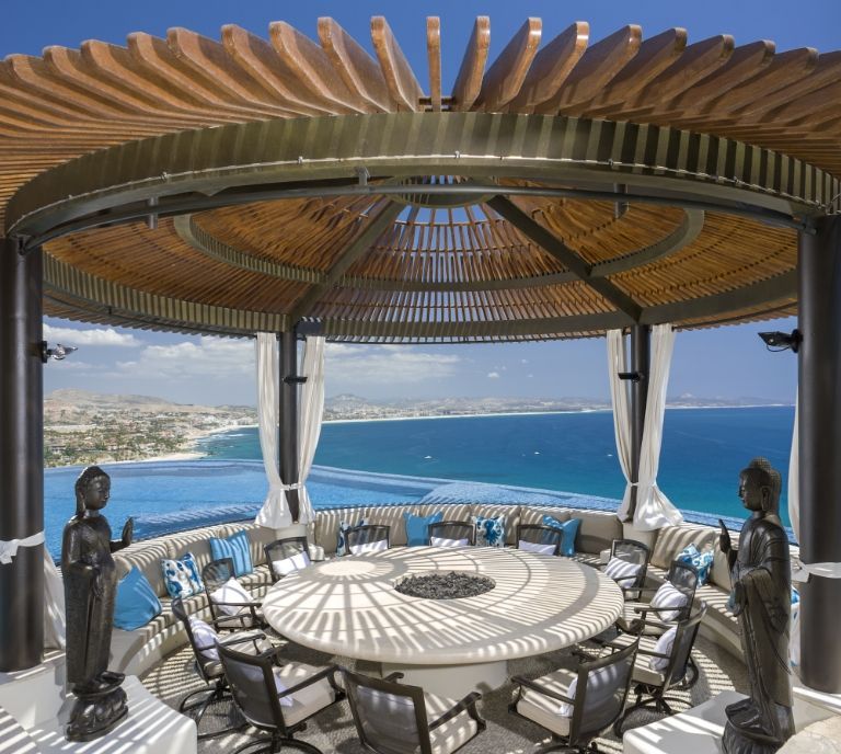 Table, Furniture, Outdoor table, Outdoor furniture, Real estate, Resort, Azure, Ocean, Shade, Restaurant, 