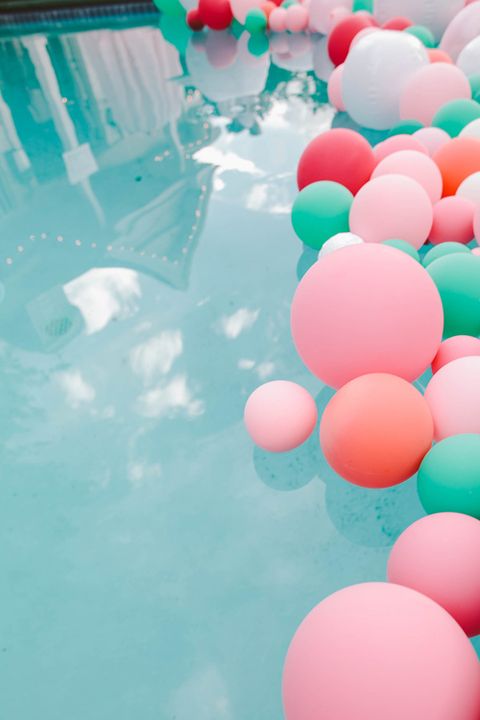 Balloon, Pink, Red, Turquoise, Party supply, Colorfulness, Material property, Swimming pool, Magenta, Circle, 