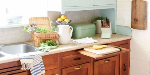 Countertop, Furniture, Room, Kitchen, Property, Cabinetry, Table, Yellow, Shelf, Interior design, 