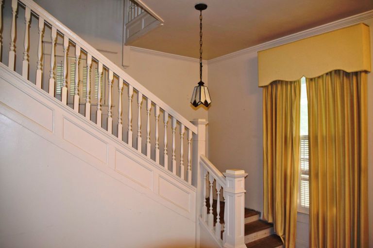 Property, Room, Stairs, Ceiling, Baluster, Yellow, Interior design, Lighting, Handrail, House, 