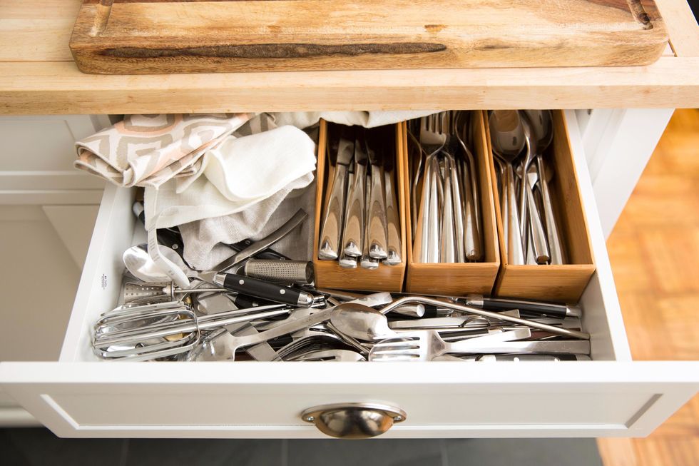 This Lid Organizer Instantly Made My Cabinets Looks Less Cluttered, and  It's Only $13 Right Now