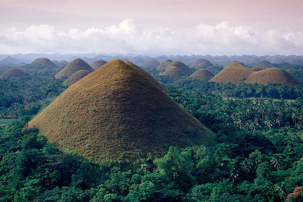 Mountainous landforms, Landmark, Mountain, Sky, Hill, Natural landscape, Pyramid, Highland, Monument, Historic site, 